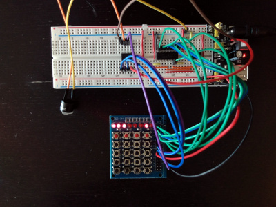 [ One ATtiny85 blinking LEDs, another reading keypresses and chirping an active buzzer in response ]